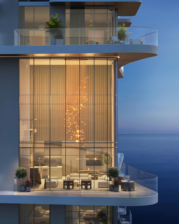 Luxurious apartment with floor-to-ceiling windows, elegant lighting fixture, modern furniture, and ocean view, creating a serene, upscale ambiance.