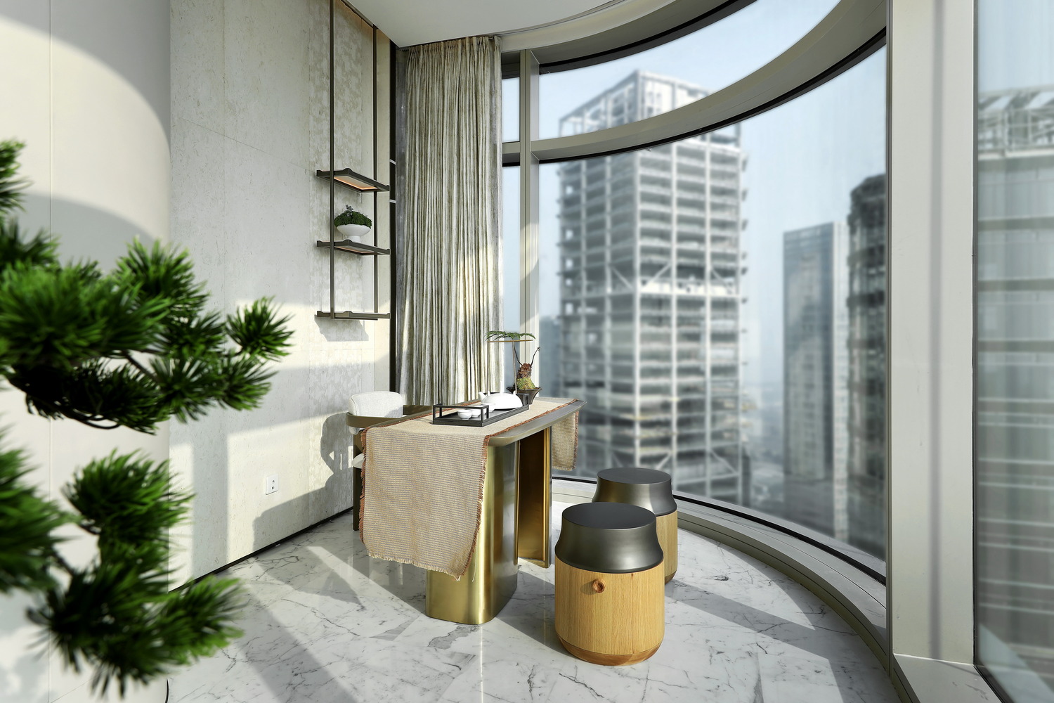 Modern room with a wooden desk and black stools by a large, curved window. High-rise buildings are visible outside. Minimalist decor and a potted plant add a serene touch.