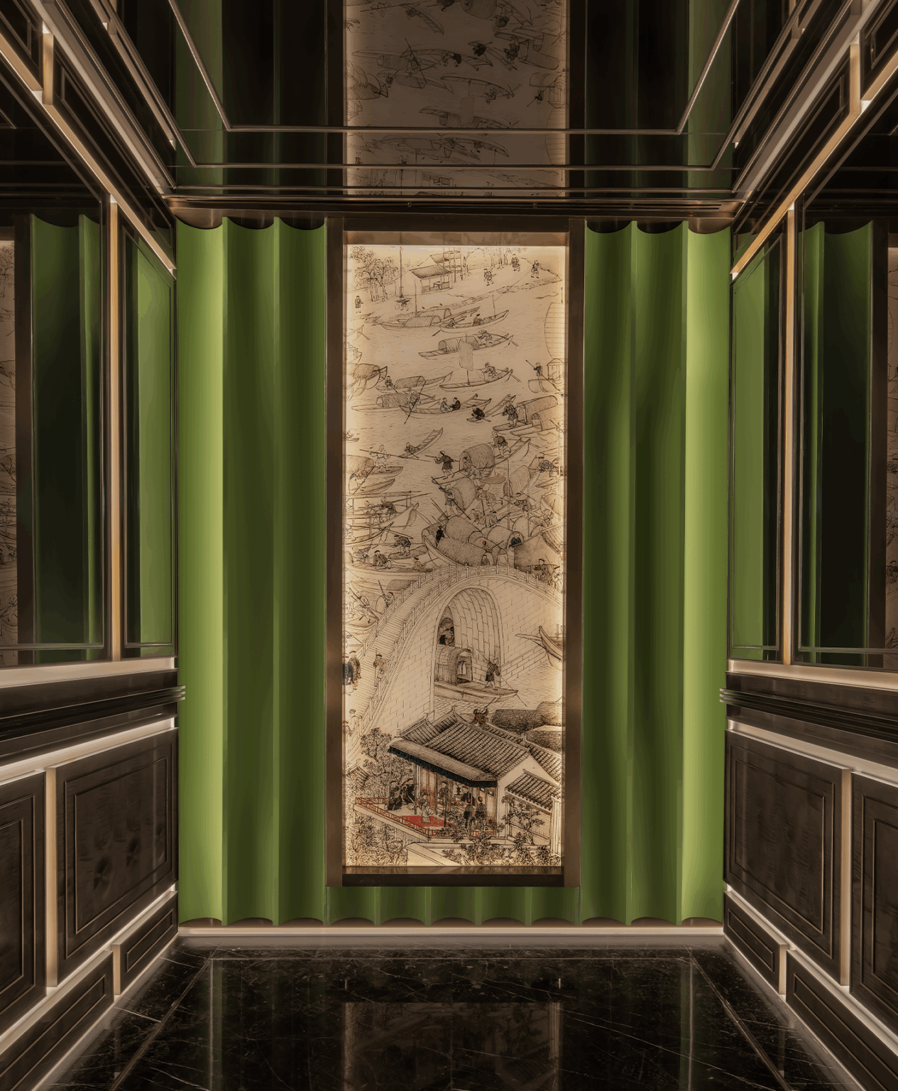 A lift car designed with moody lighting, and a tapestry-like art piece