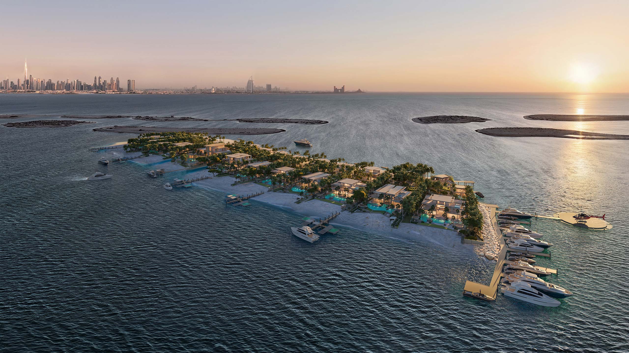 Aerial view of Amali Islands Dubai with villas and palm trees surrounded by calm sea. Yachts are docked at the marina; distant Dubai's skyline at sunset.
