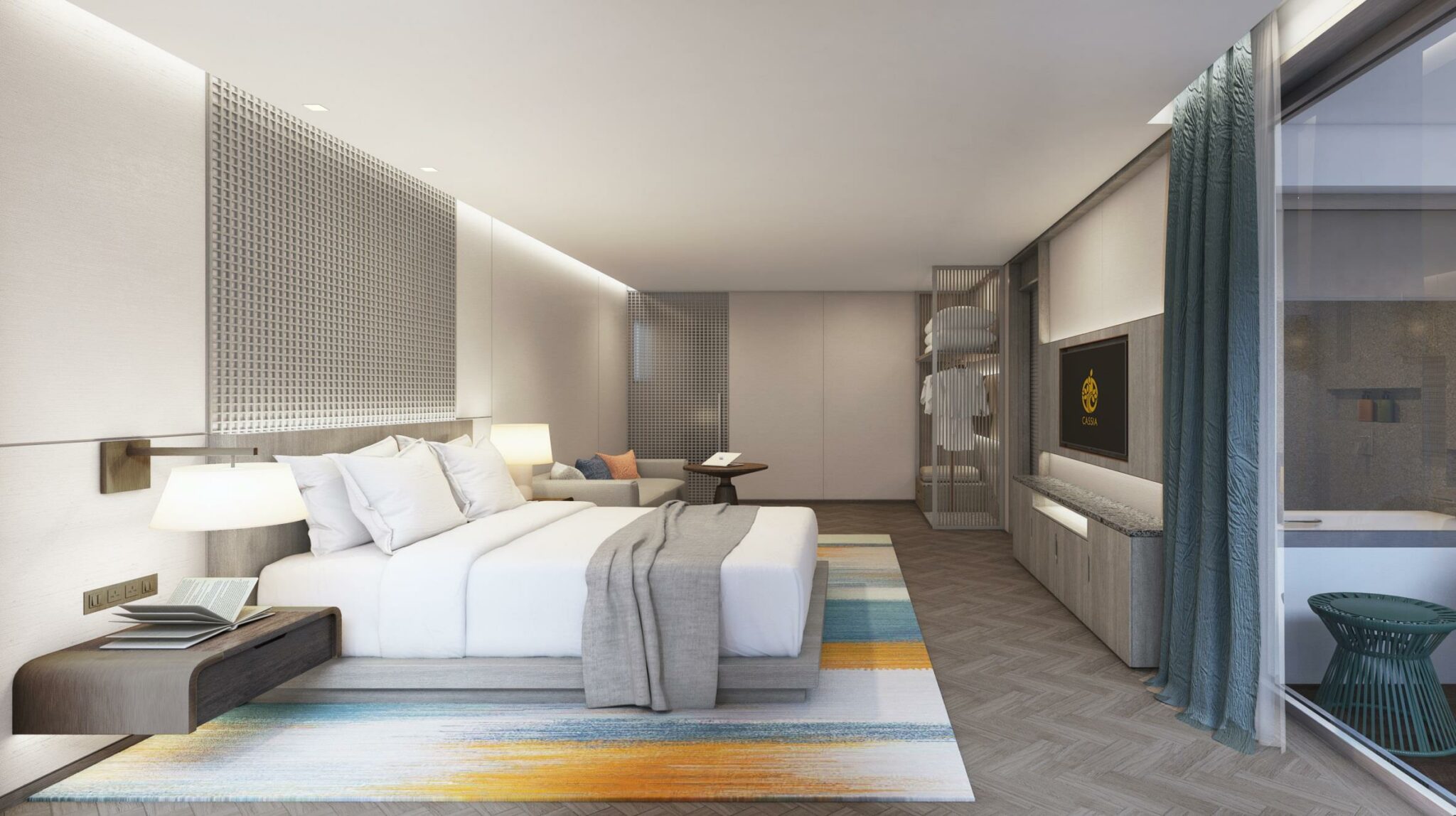 Modern hotel room with a king-sized bed, white bedding, and gray accents. A colorful rug adds vibrancy. A wall-mounted TV and elegant decor create a serene atmosphere.