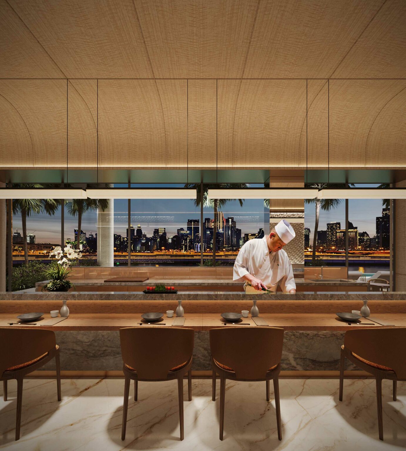 A chef in a white uniform prepares food at a stylish home dining area with a panoramic Dubai's skyline view at night. Elegant decor and warm lighting set a sophisticated tone.
