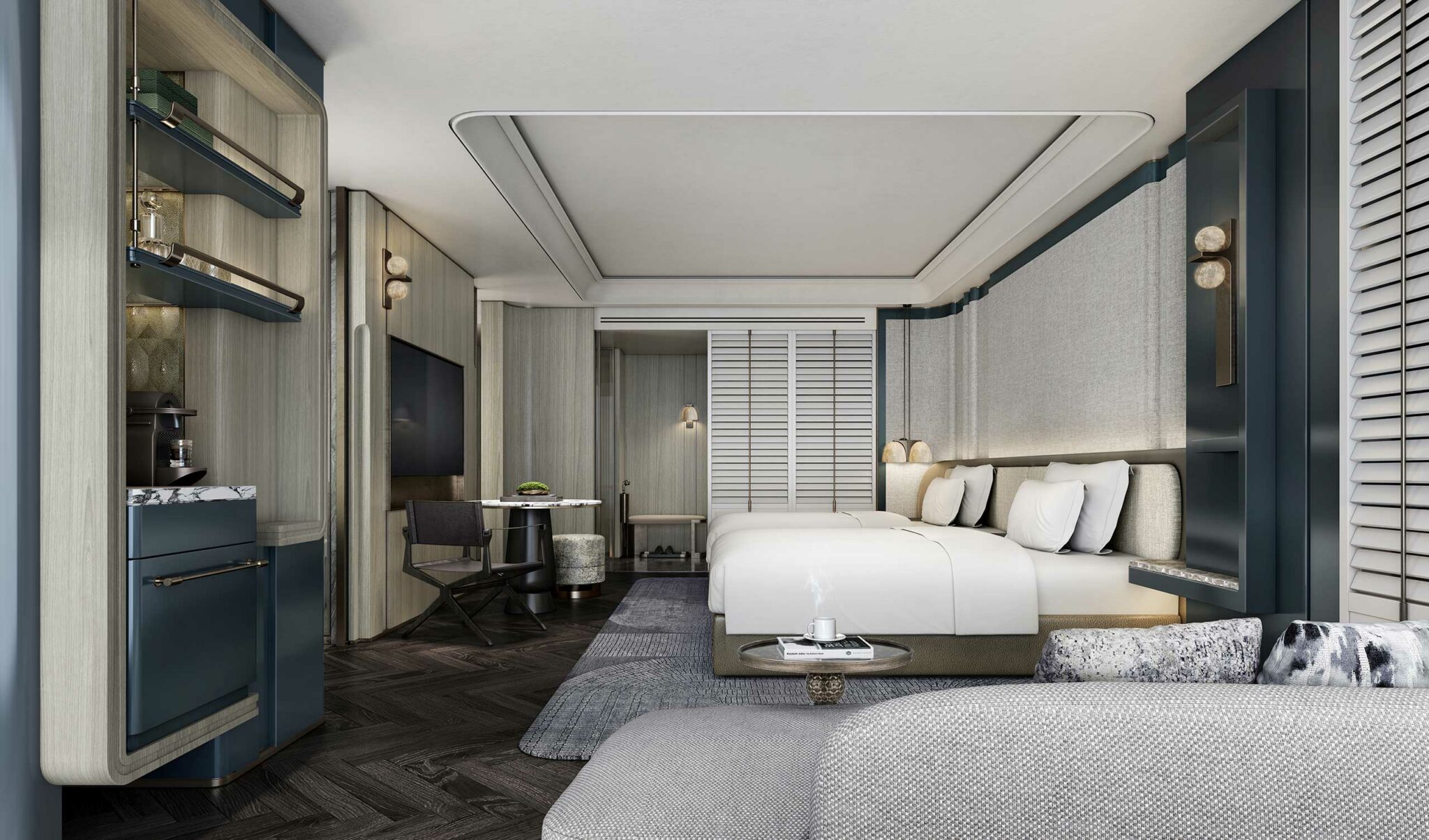 Modern hotel room with two beds, sleek gray tones, and elegant lighting. Features include a seating area, TV, and minibar, creating a cozy yet sophisticated ambiance.