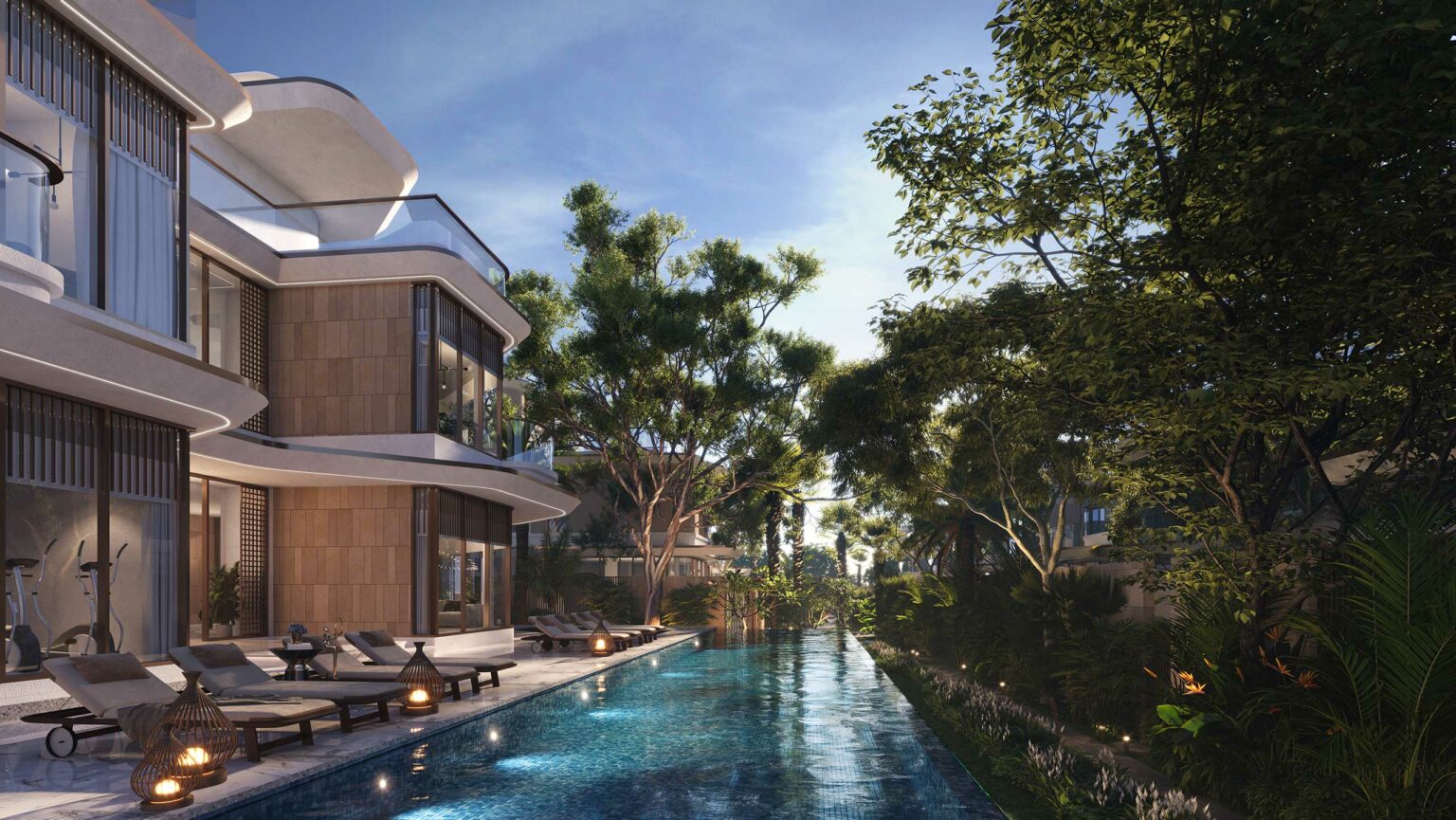 Modern villa with a pool, surrounded by lush trees. Sun loungers and lanterns line the poolside, under a clear blue sky, creating a serene ambiance.