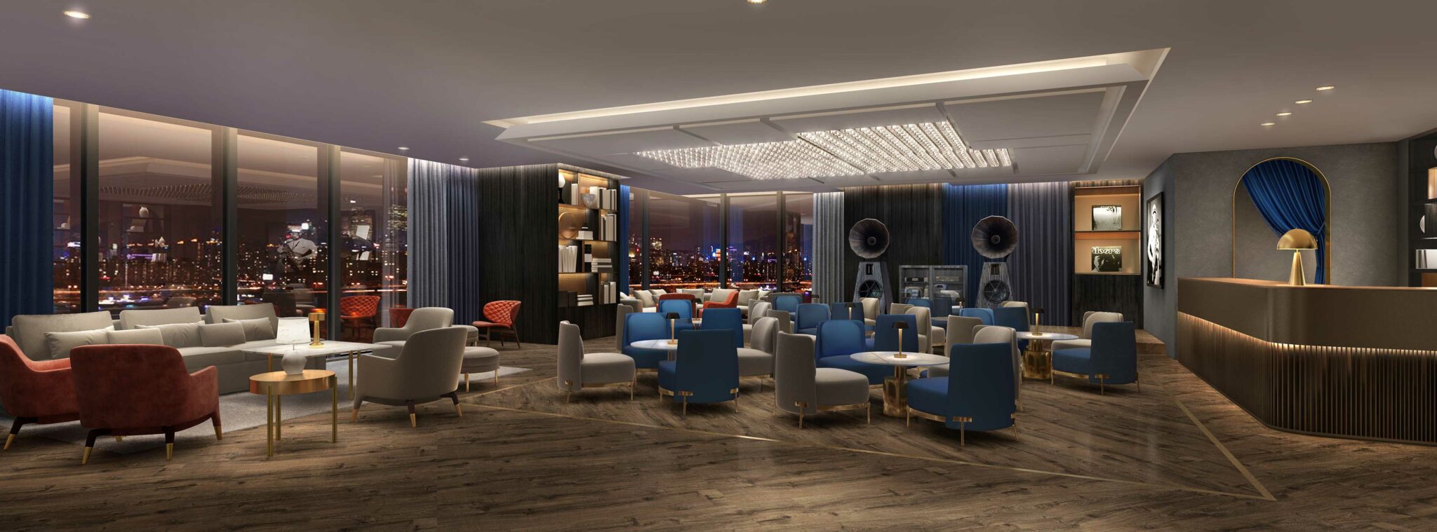 Luxurious residential lounge with modern blue and white seating, large windows displaying a night city skyline. Soft lighting and elegant decor create a sophisticated ambiance.
