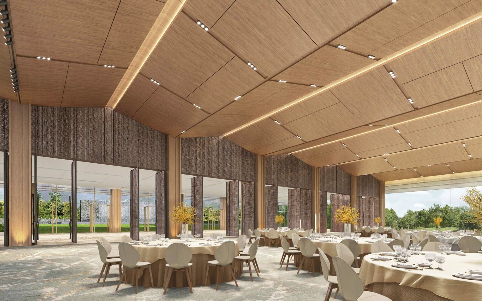 Spacious, elegant resort banquet hall with round tables and chairs, set for a formal event. Wooden ceiling, large windows, and greenery outside add warmth and openness.