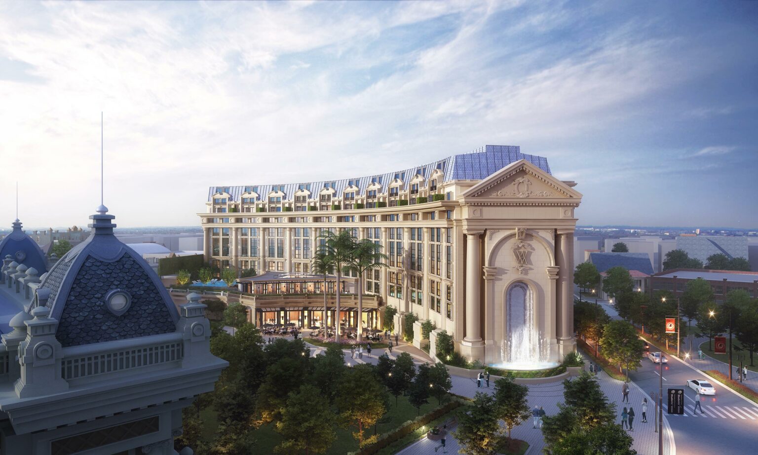 Exterior of Waldorf Hanoi Opera Hotel, Vietnam, featuring a grand hotel with Neoclassical architecture with large windows, ornate details, and a central, arched façade.