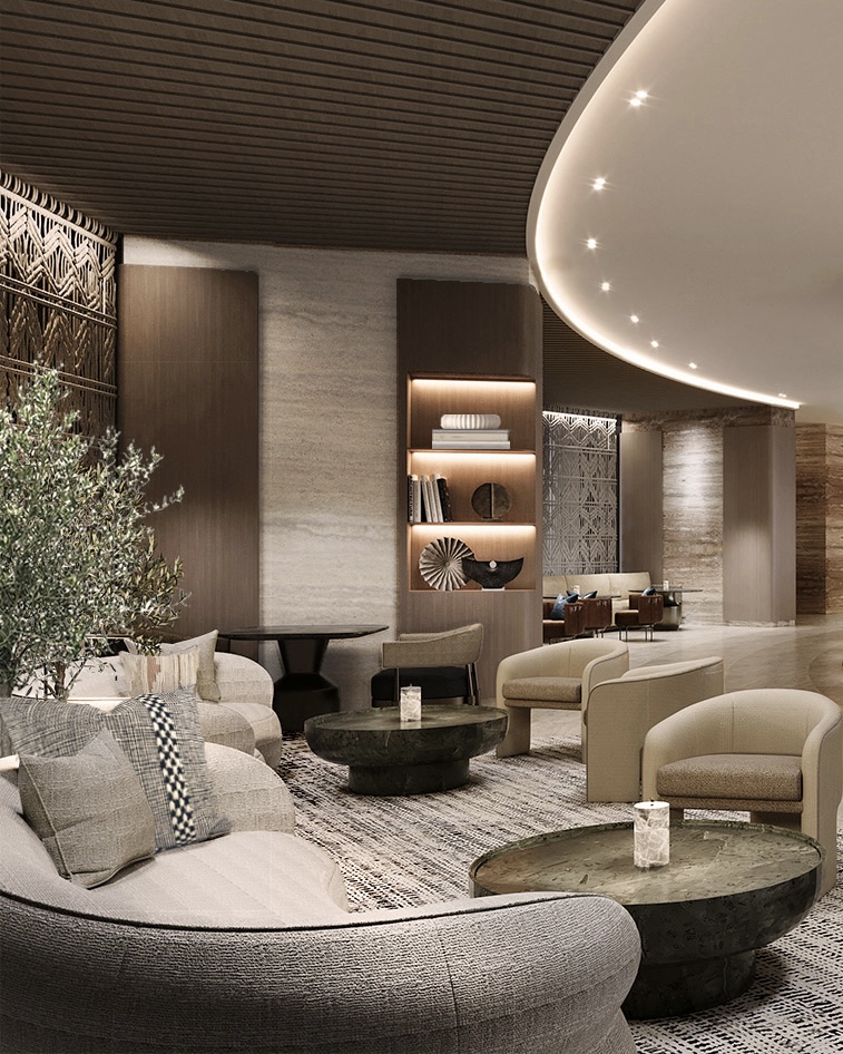 Modern residential lobby with plush beige chairs, dark marble tables, and a central fireplace. Shelves with decor items create a cozy, luxurious ambiance.