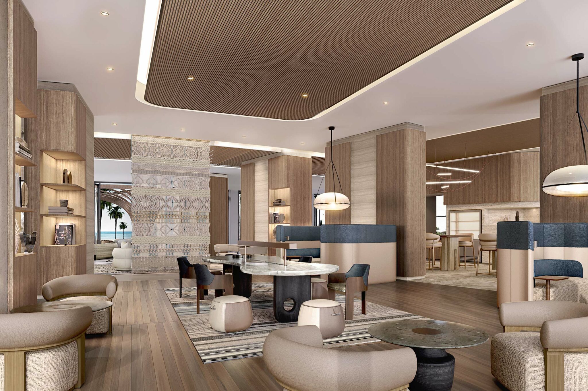 Residential modern co-working space with sleek, wooden interiors, plush seating, and artistic lighting. Large windows reveal a serene beach view, creating a cozy atmosphere.