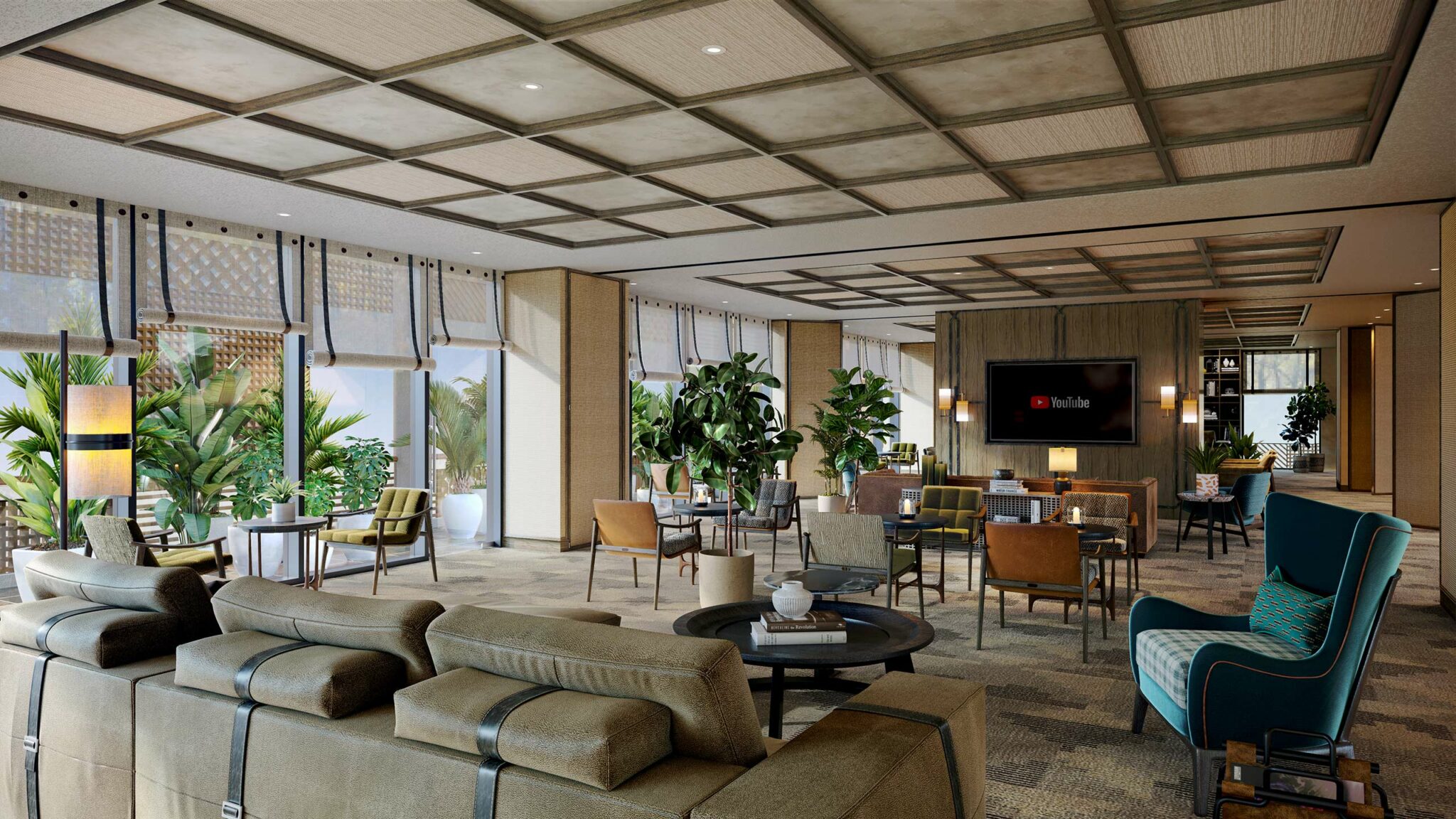 Spacious, modern multi-purpose area with abundant greenery, comfortable seating, and a warm ambiance. A large TV displaying the YouTube logo hangs on a wooden wall.