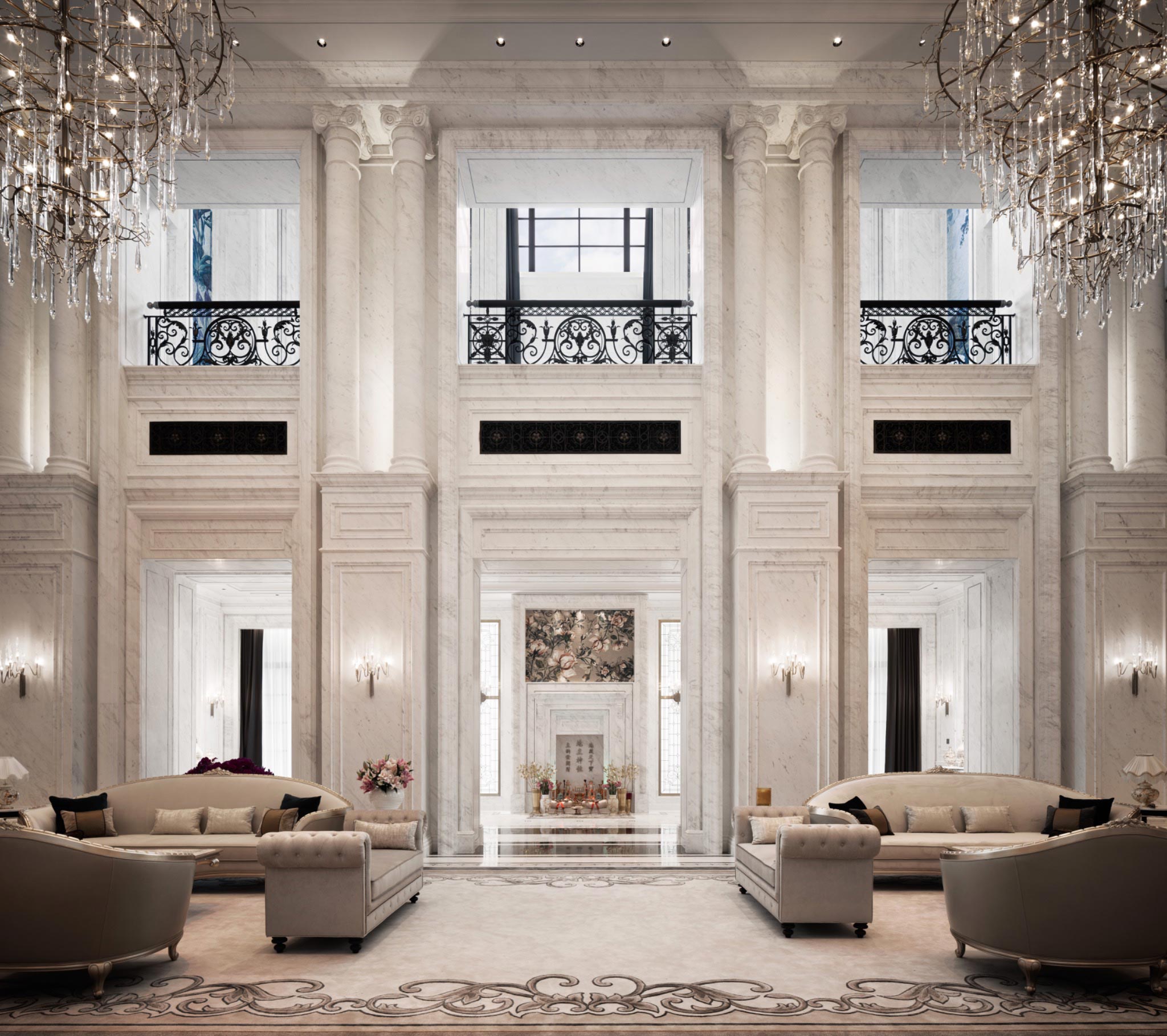 Luxurious living room with tall white columns and ornate chandeliers. Elegant beige sofas and floral arrangements convey a sophisticated, serene ambiance.