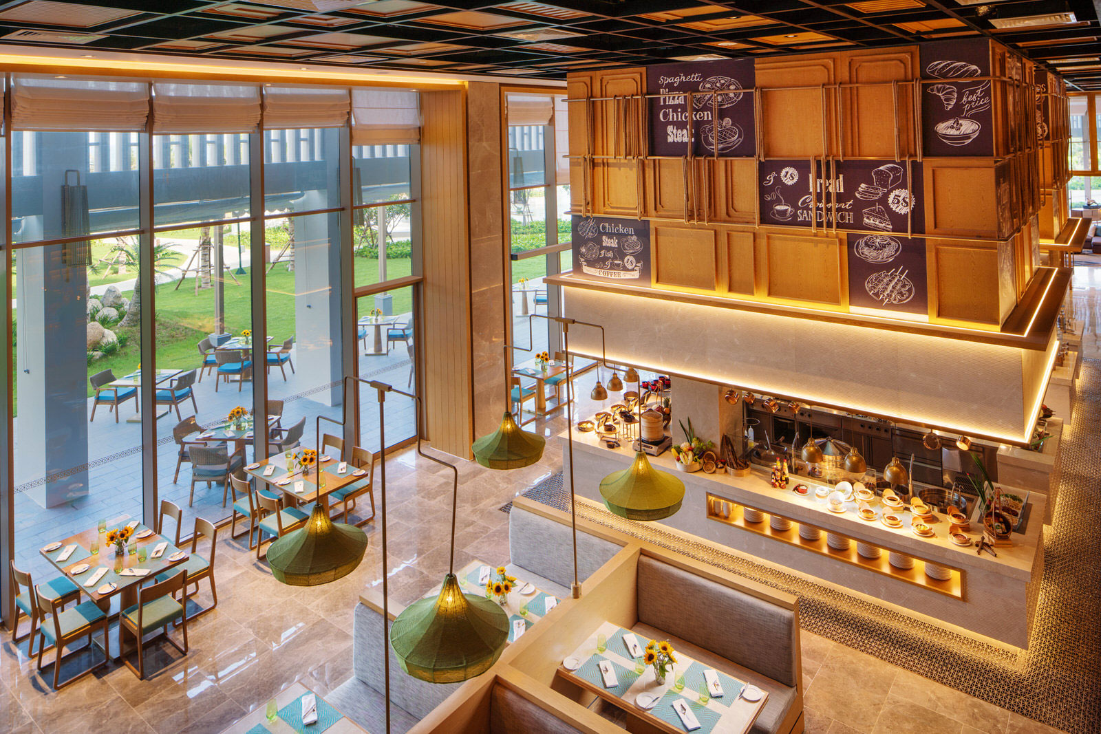 Elegant restaurant interior with high ceilings, large windows, and outdoor views. Warm lighting, stylish decor, and neatly set tables create a cozy ambiance.