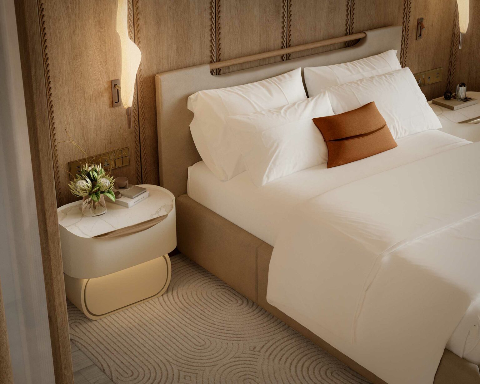 Elegant suite bedroom with a cozy beige bed, white linens, and a brown accent pillow. A chic lamp and plant adorn a modern nightstand, exuding warmth.