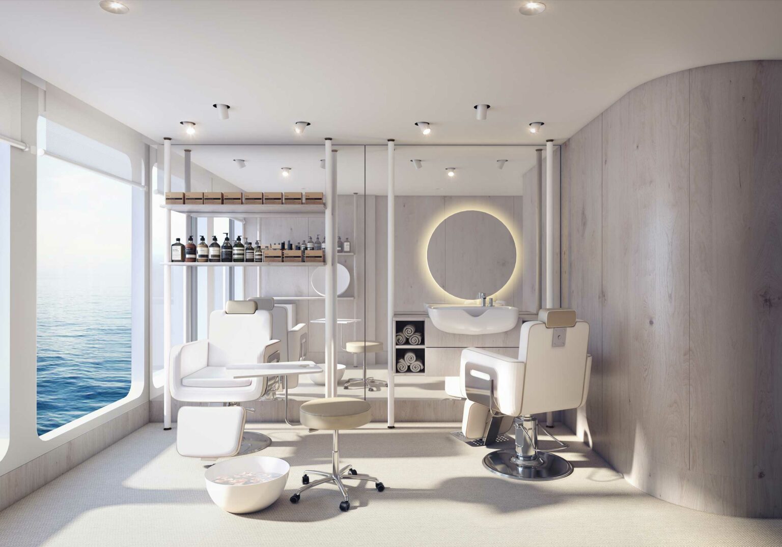 Modern cruise salon room with large windows overlooking the ocean. Features sleek white furniture, a round mirror with backlighting, and neatly arranged products. Airy and serene ambiance.