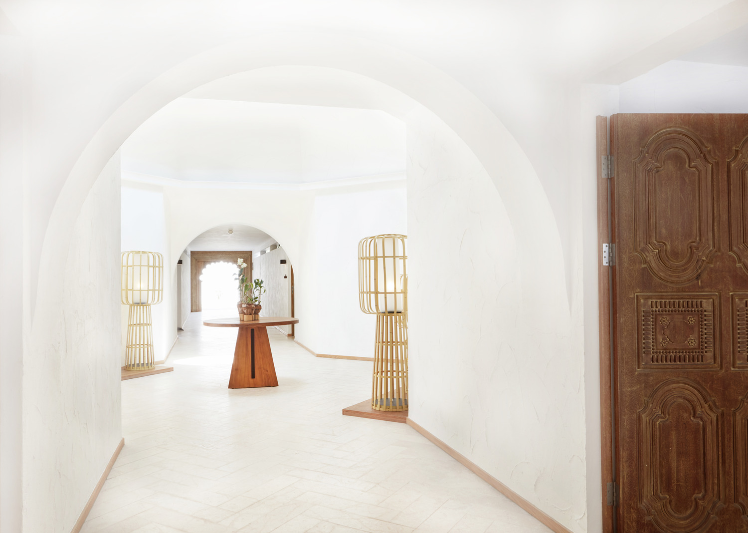 A tranquil, seaside inspired spa treatment room with traditional Maldivian accents.