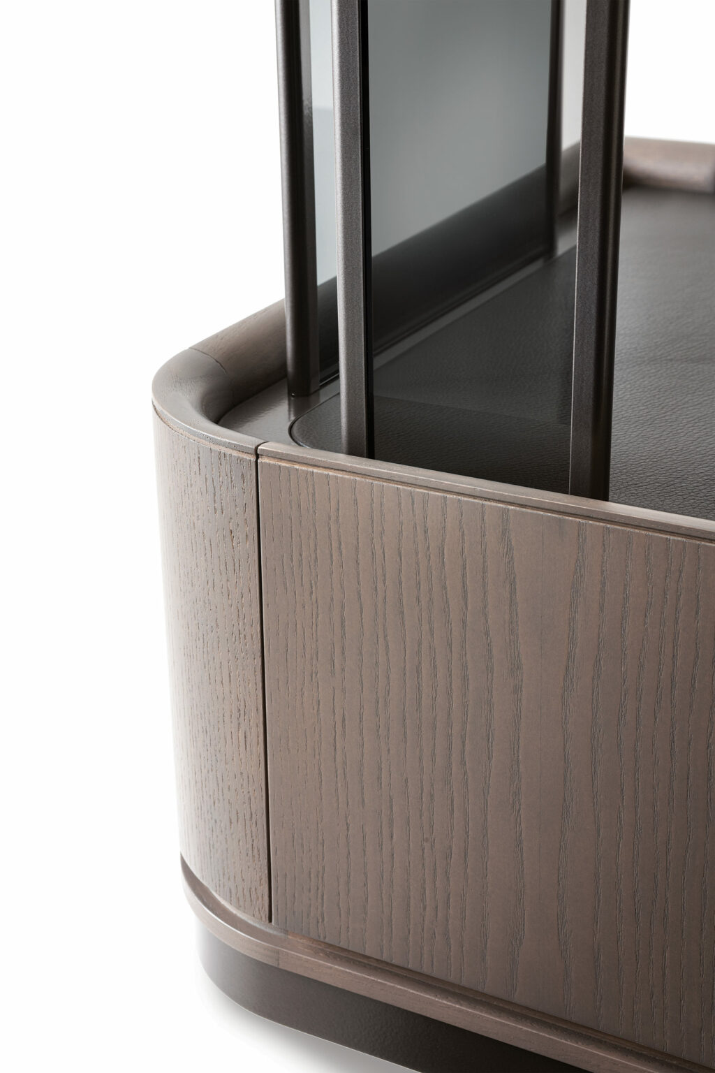 Close-up of a modern brown cabinet corner with vertical metal bars. The wood has a smooth, brown finish with a subtle grain pattern, conveying elegance.