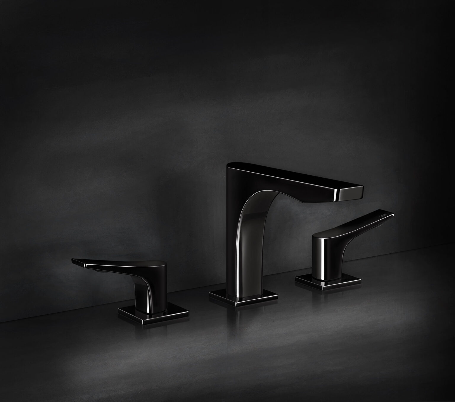 Sleek black bathroom faucets on a dark gray background. The modern design and glossy finish create a sophisticated and minimalist aesthetic.