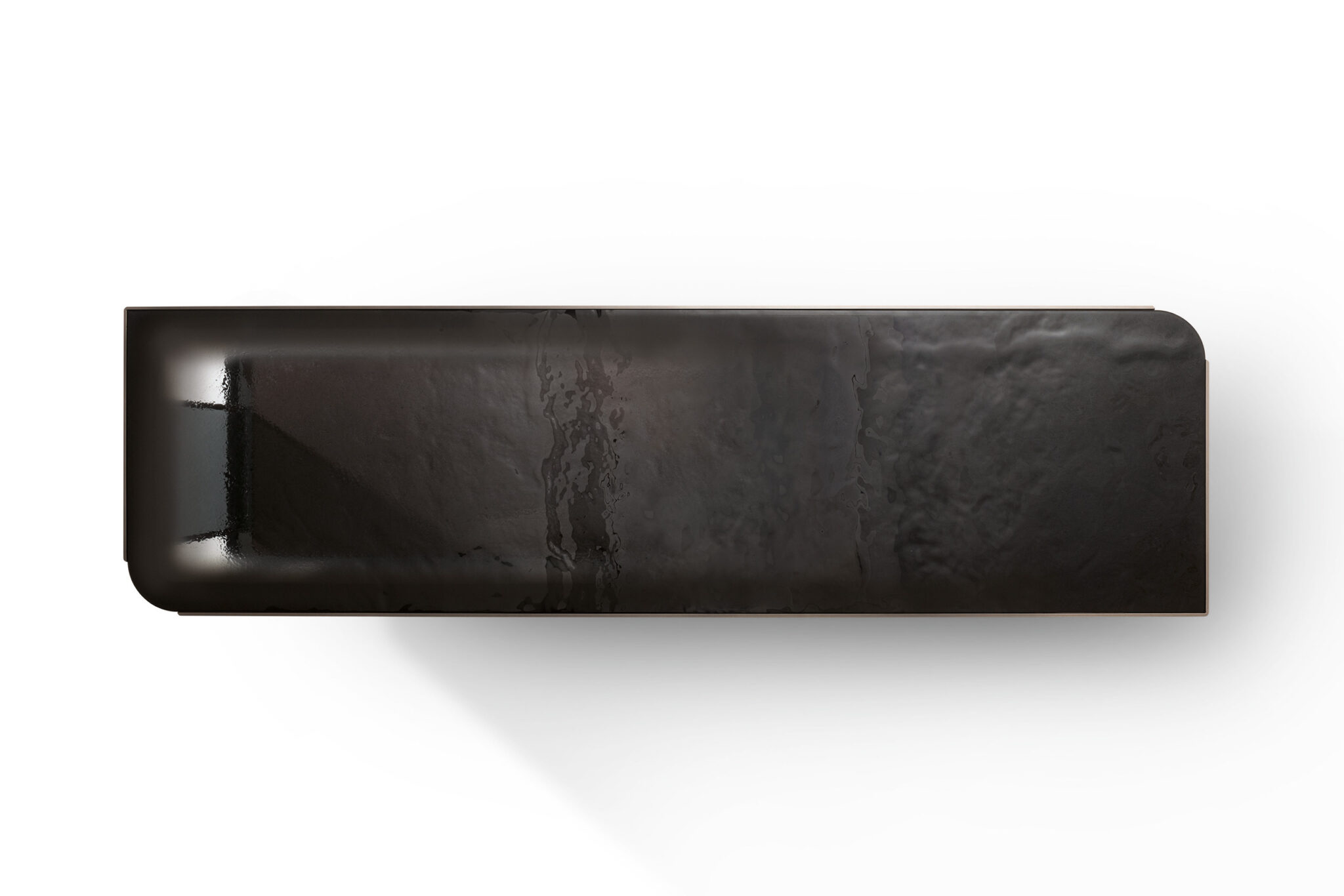 Close-up of a sleek, modern sideboard's dark, rectangular surface with rounded corners and a glossy, wavy texture. Subtle light reflections create a reflective feel. Minimalist and elegant design.