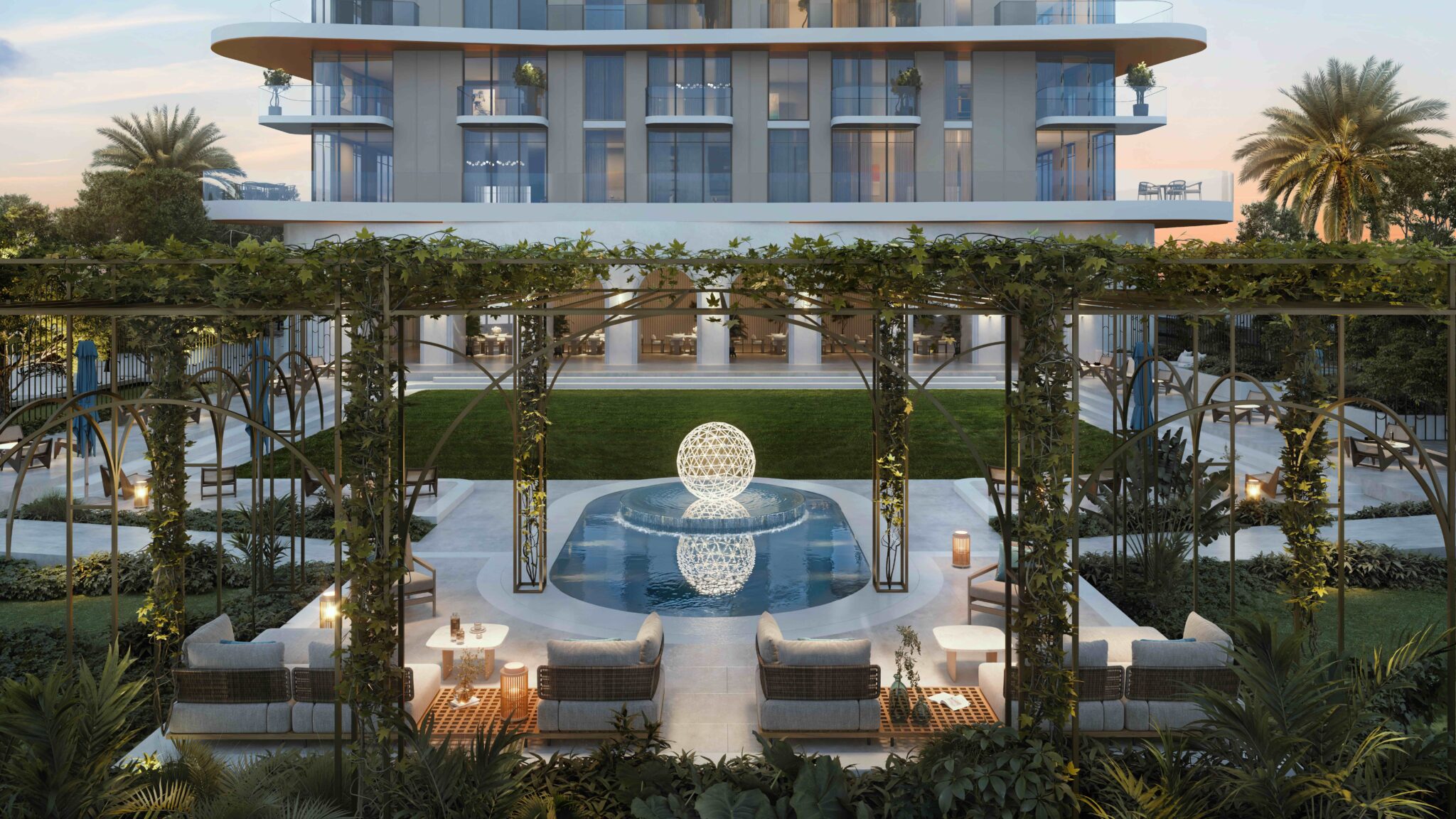 Luxurious patio with modern sofas, a glowing orb in a pool reflecting nearby apartment balconies and palm trees at sunset, exuding elegance.