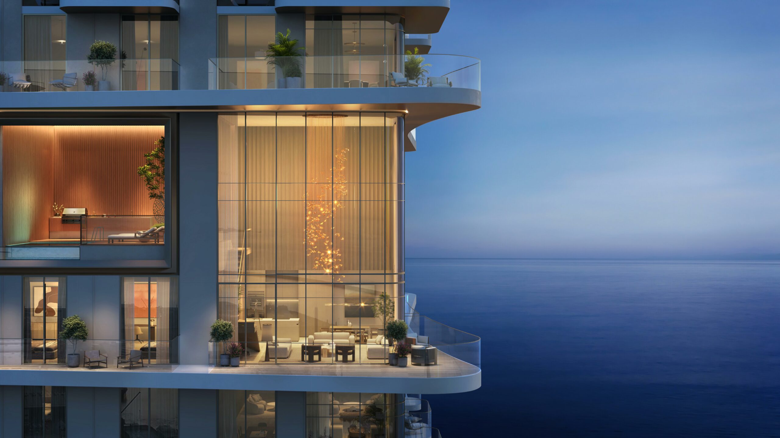Luxurious apartment with floor-to-ceiling windows, elegant lighting fixture, modern furniture, and ocean view, creating a serene, upscale ambiance.