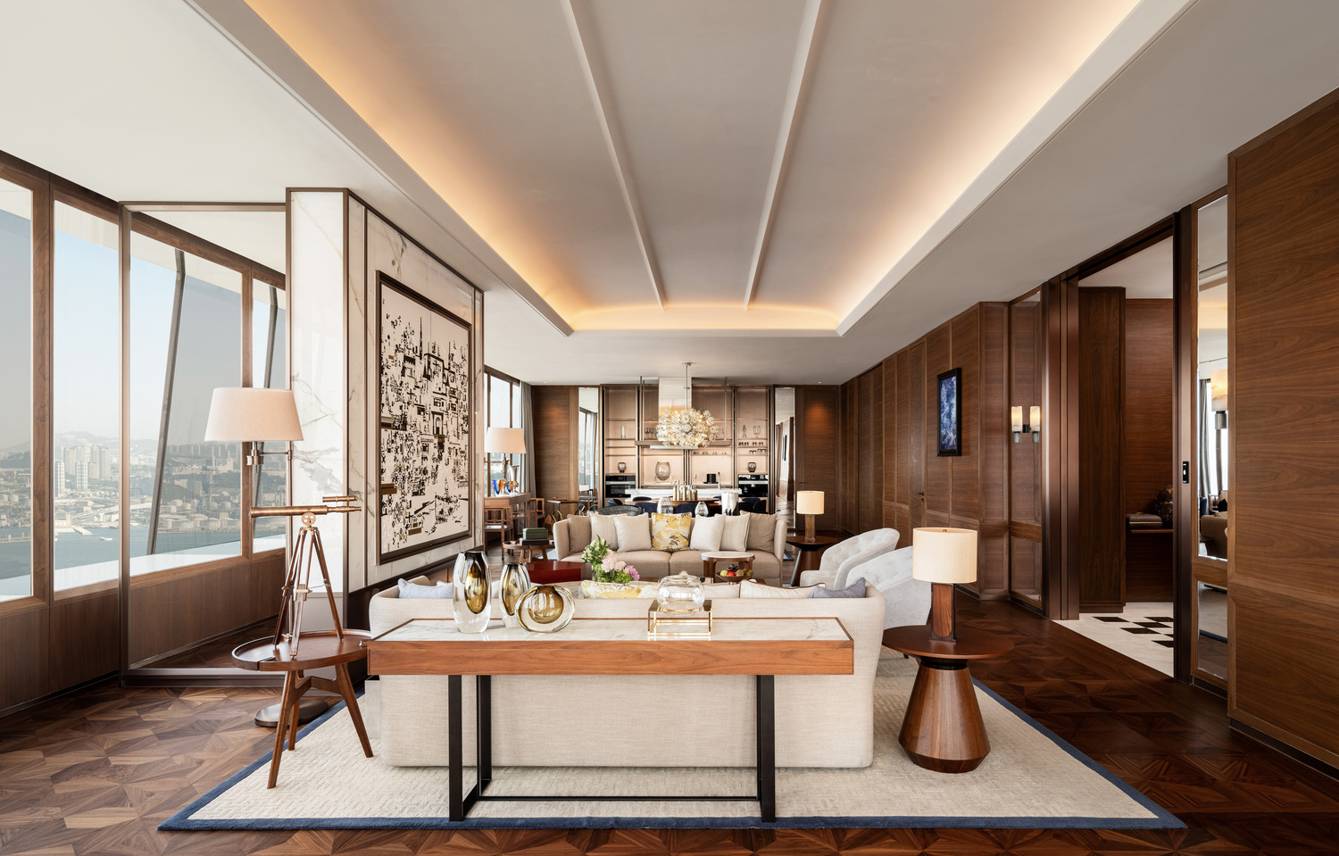 Luxurious living room with modern decor, featuring a large artwork, cream sofas, elegant lamps, and city views through expansive windows. Warm ambiance.