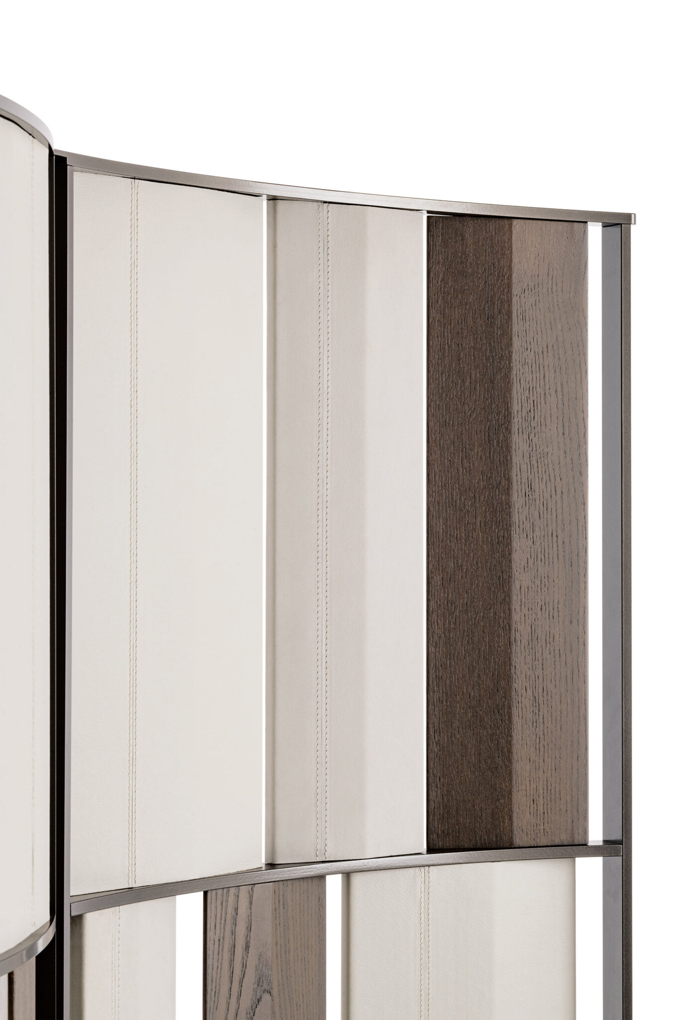 Close-up of a a three-panel room divider with vertical beige and brown panels arranged in an alternating pattern. The metal frame gives a modern, elegant look.