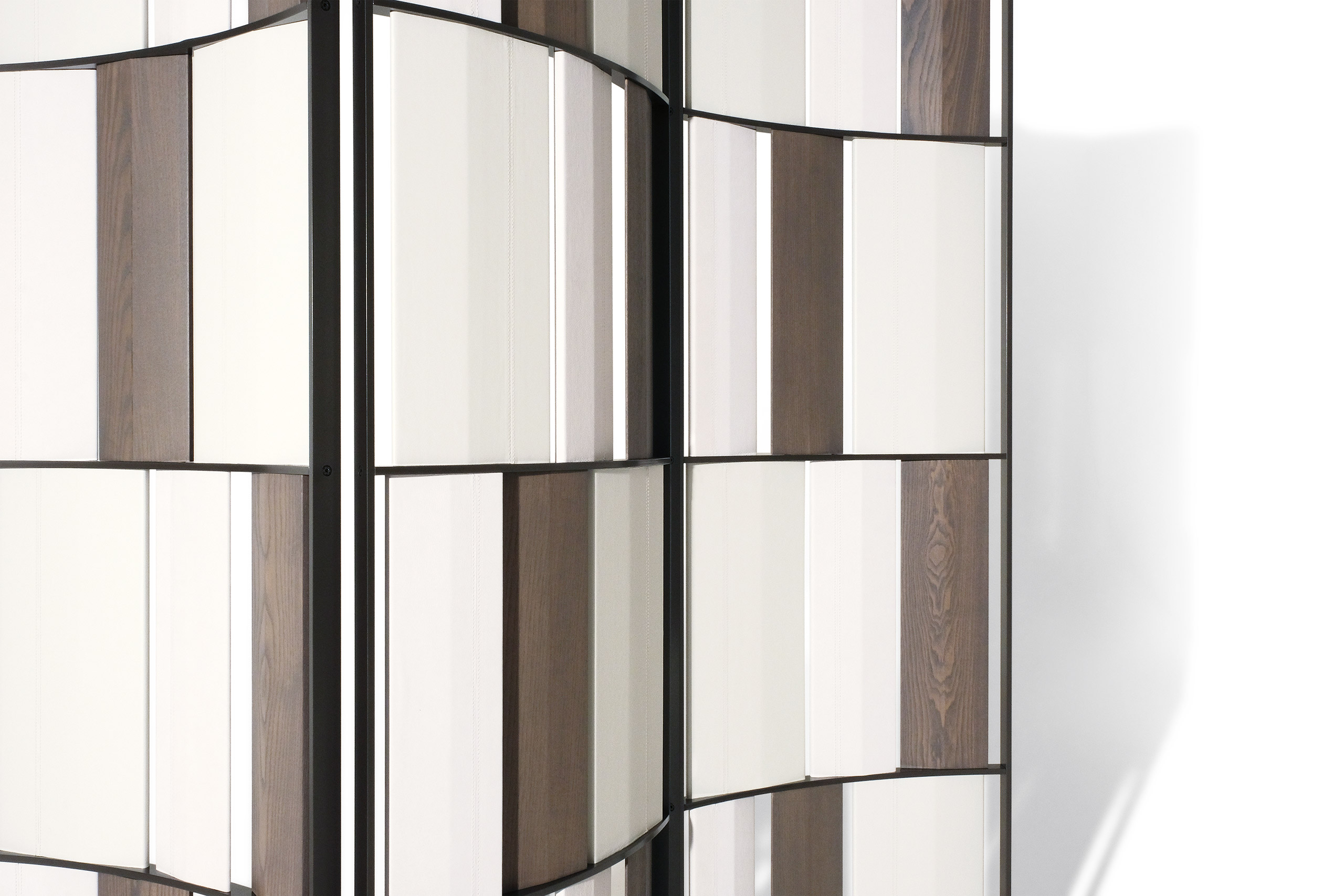 A three-panel room divider with vertical beige and brown panels arranged in an alternating pattern. The metal frame gives a modern, elegant look.