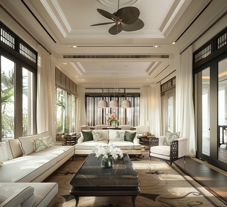 Luxurious living room with elegant white sofas, tropical-themed pillows, and a black marble coffee table. Soft lighting and large windows create an airy, serene atmosphere.