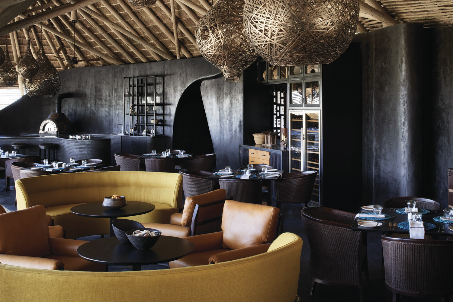 A luxury African safari lodge, characterised by design rooted in cultural nuance and bespoke details throughout.