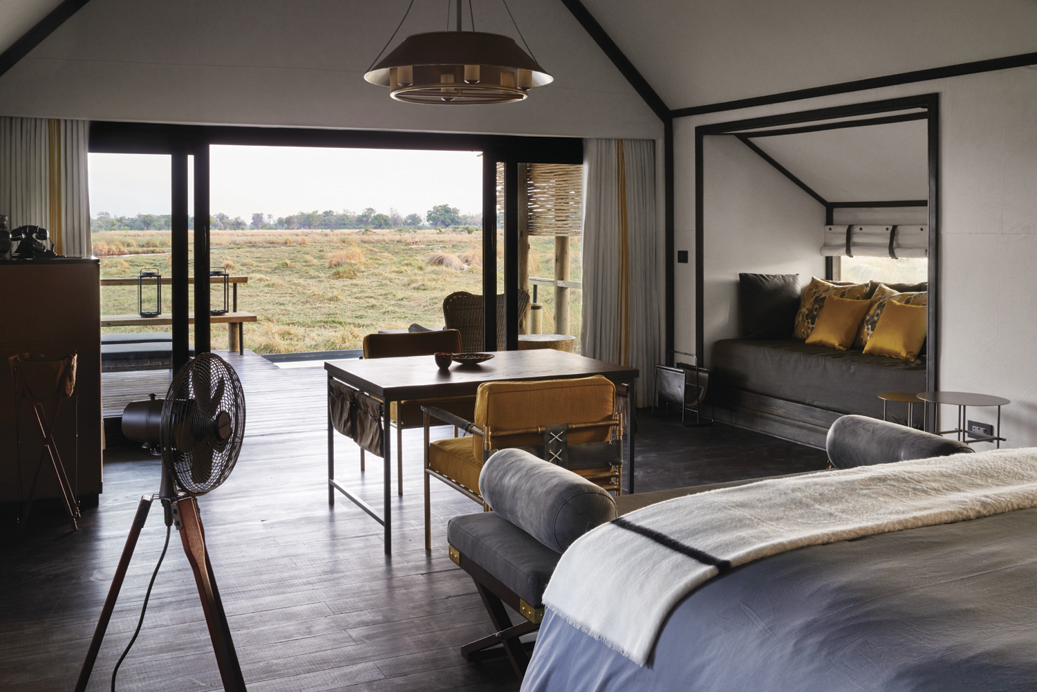 A luxury African safari lodge, characterised by design rooted in cultural nuance and bespoke details throughout.