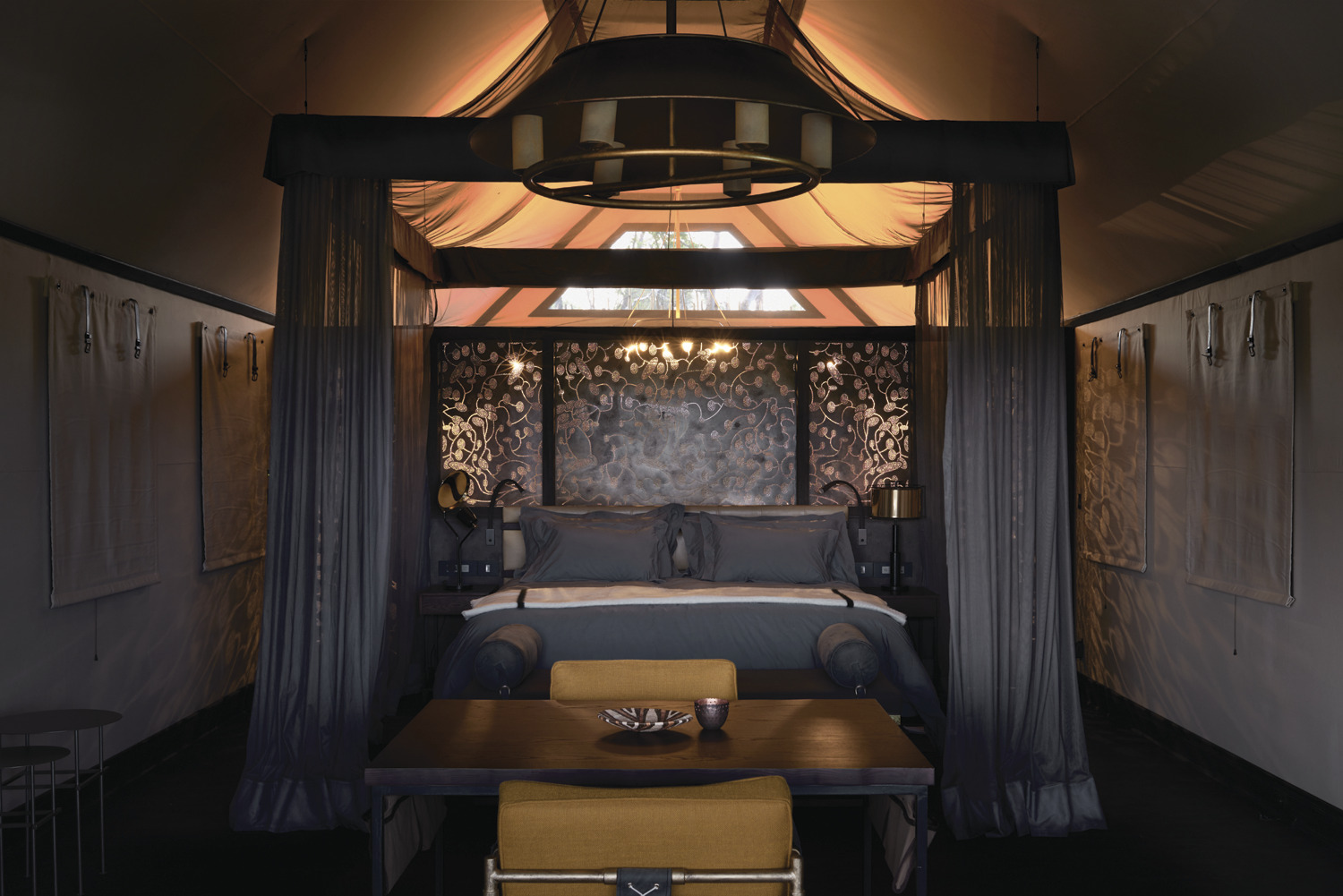 A luxury African safari lodge, characterised by design rooted in cultural nuance and bespoke details throughout.