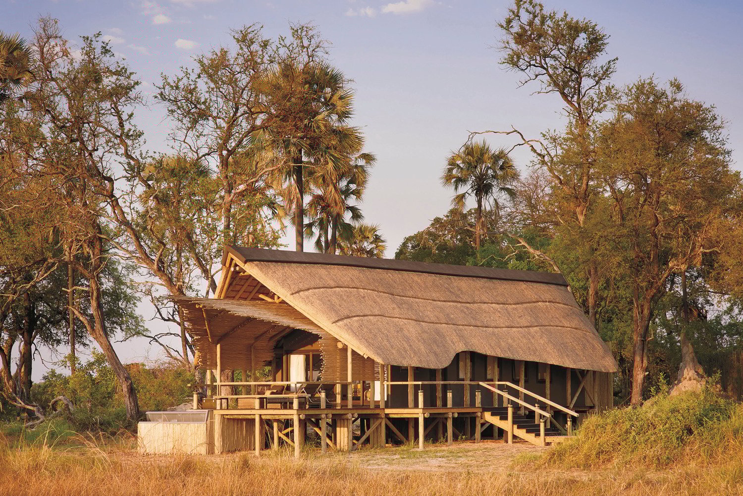 A luxury African safari lodge, characterised by design rooted in cultural nuance and bespoke details throughout.