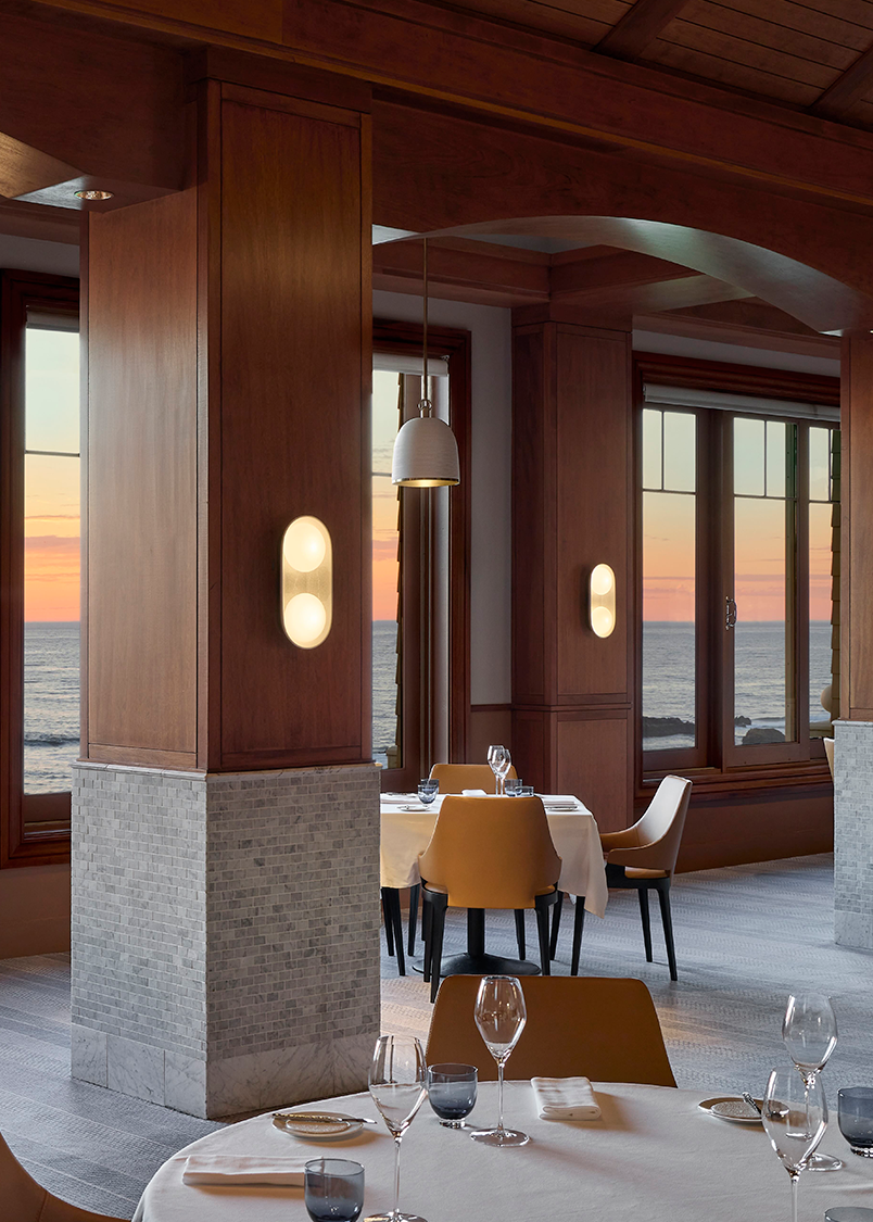 A contemporary restaurant looking out to the sweeping ocean vistas.