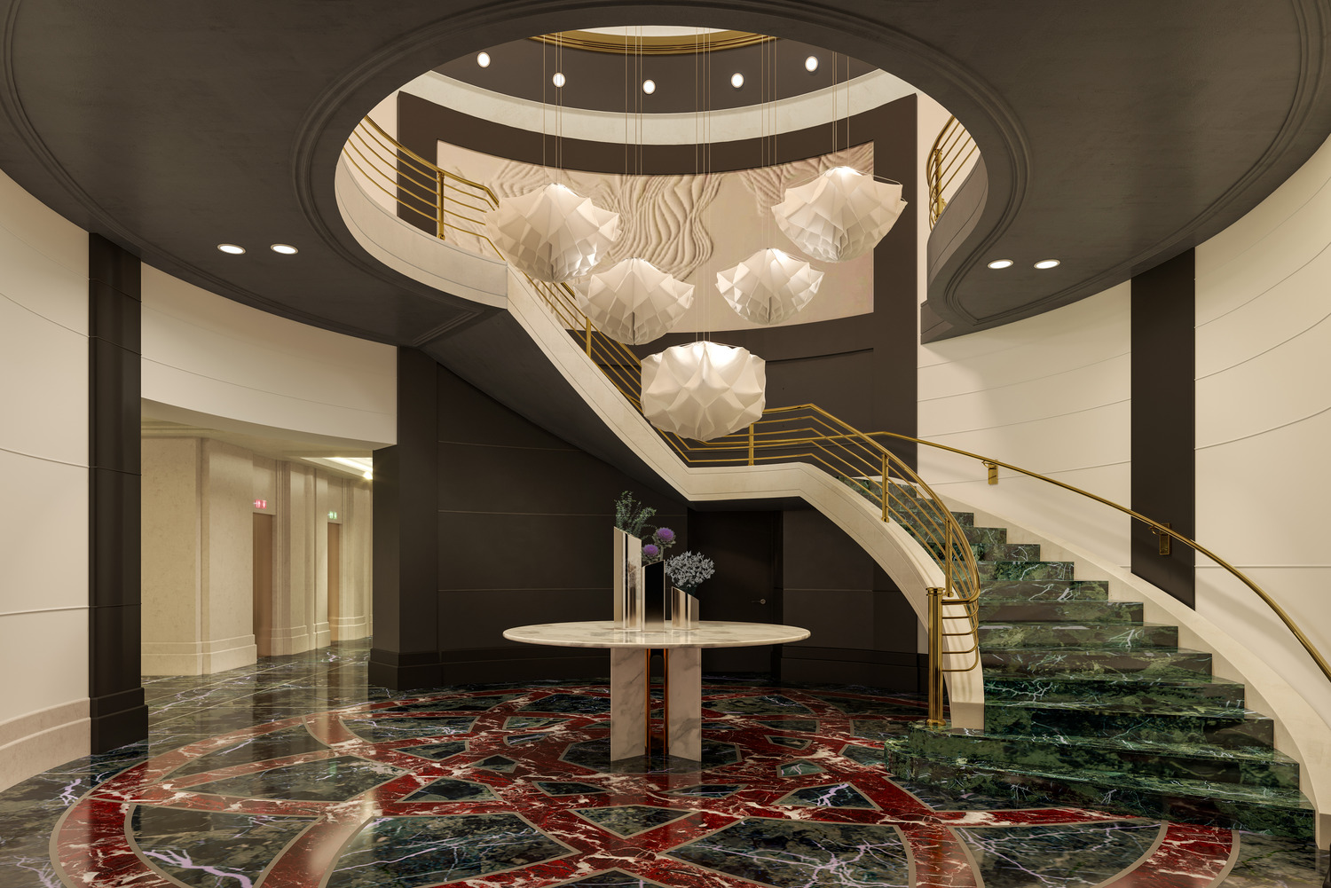 A sweeping staircase with green marble steps and golden railings rises beneath sculptural pendant lights and a dramatic marble floor inlay.
