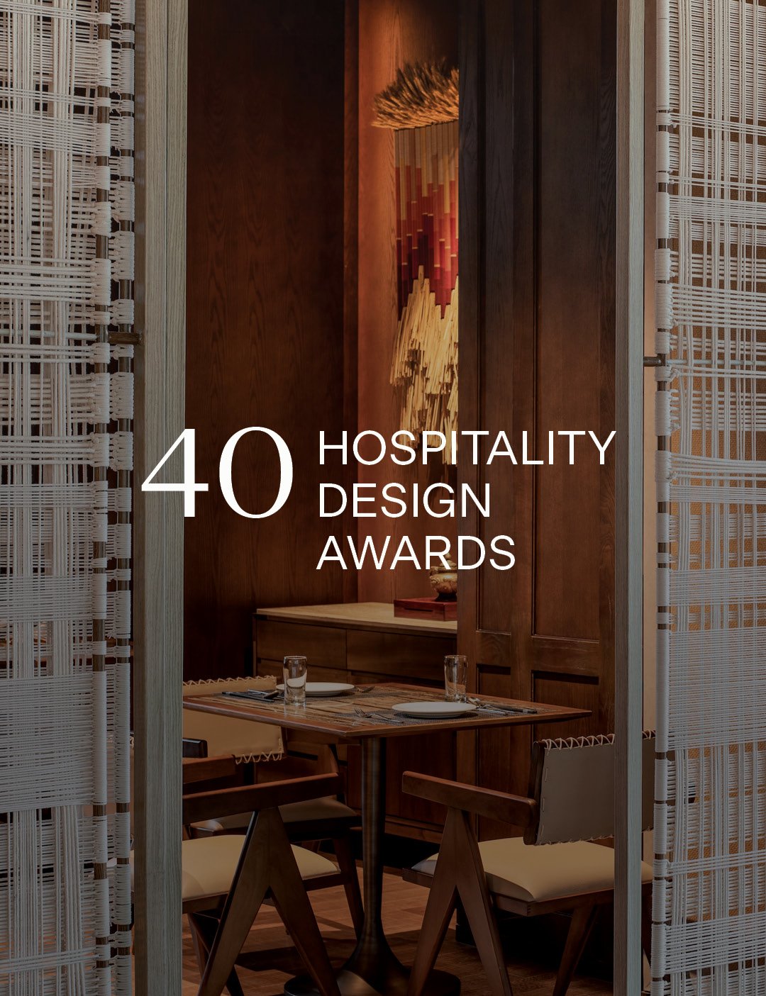 Interior view of an elegantly designed dining space with wooden accents and modern decor. The text 