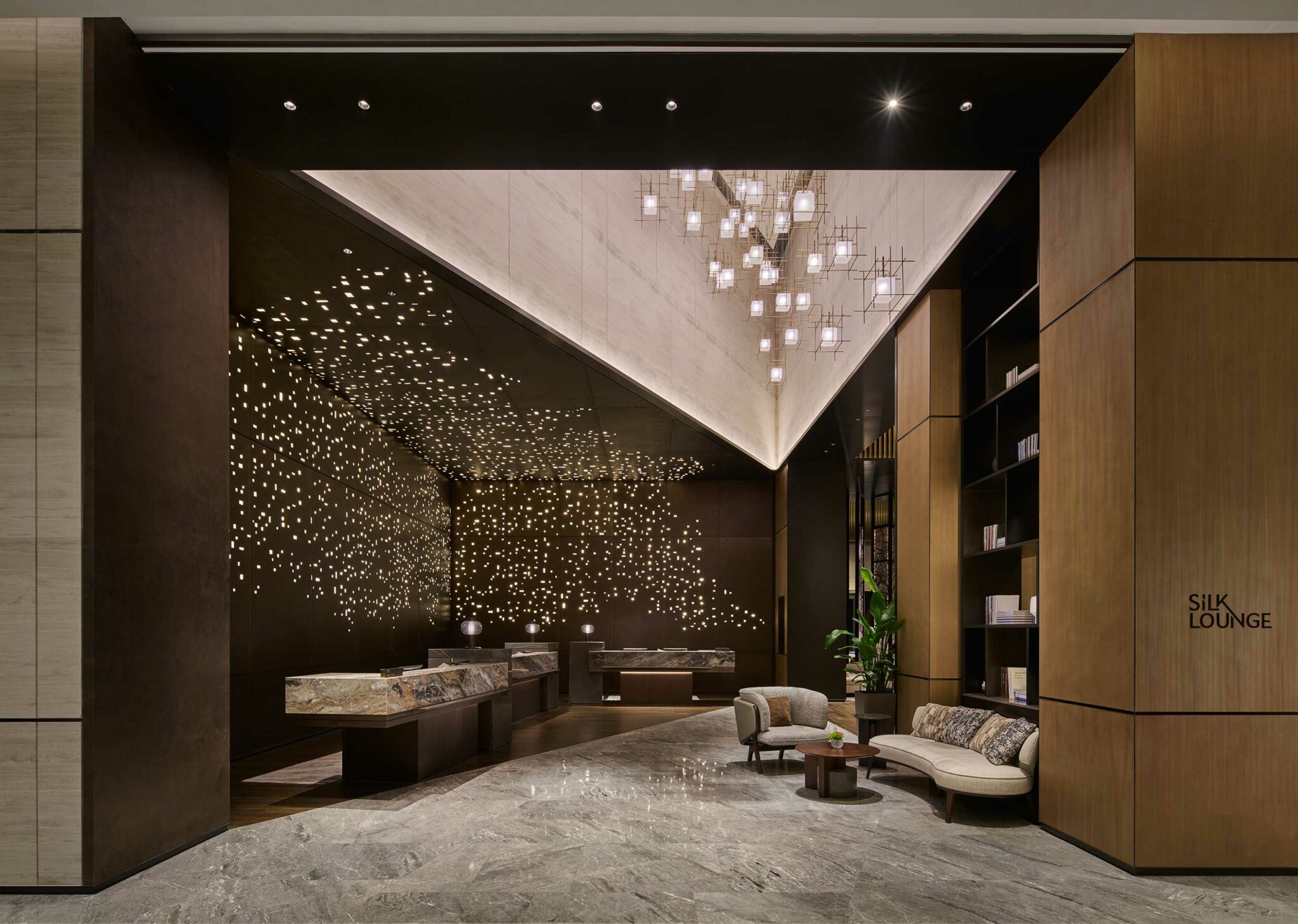 Hilton Shanghai Zhangjiang Science City Silk Lounge with marble counters, starry ceiling lights, modern seating, and luxury interior design
