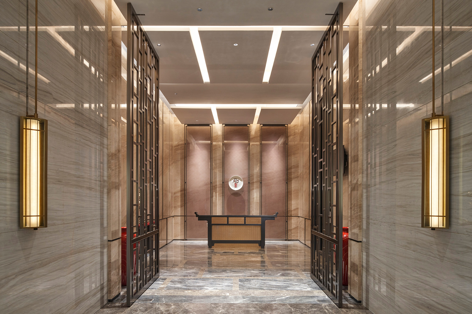 Modern hotel lobby with a sleek marble reception desk, vibrant teal and red shelving, elegant lighting, and a lush indoor tree. The space conveys luxury.