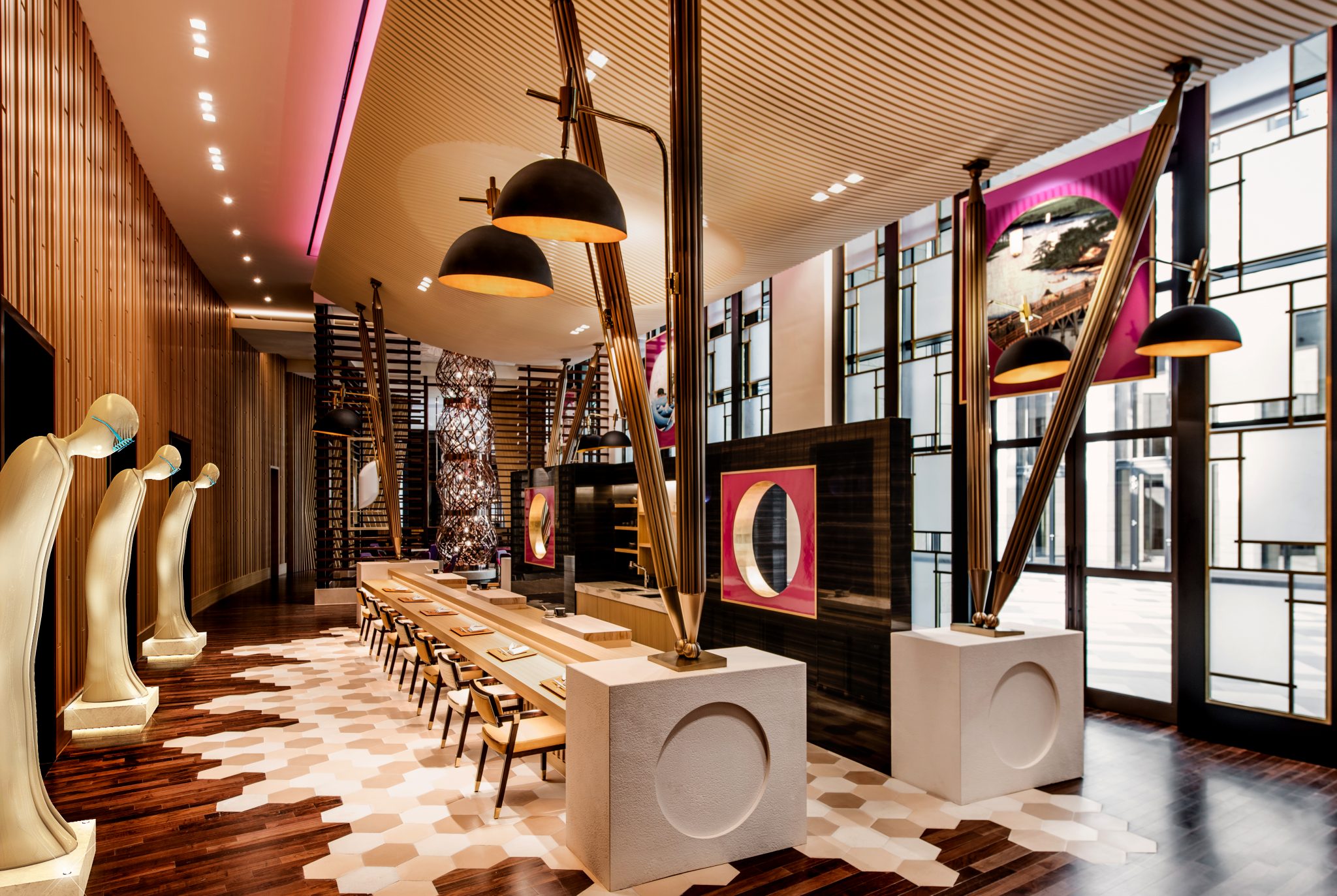 A vibrant casino interior featuring luxurious chandeliers, colorful slot machines, and stylish gaming tables, creating an energetic and glamorous atmosphere for guests seeking entertainment and excitement.